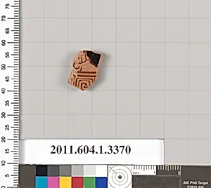 Terracotta fragment of a kylix (drinking cup)