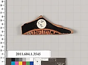 Terracotta fragment of a kylix (drinking cup)