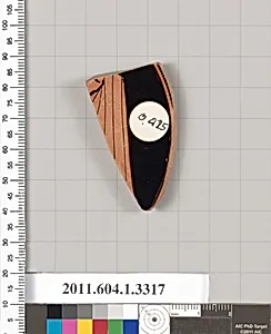 Terracotta fragment of a kylix (drinking cup)
