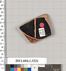 Terracotta fragment of a kylix (drinking cup)