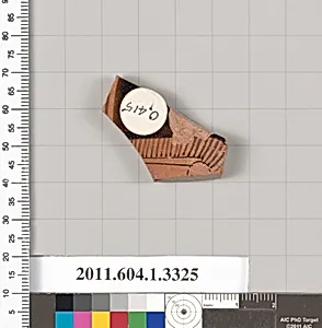 Terracotta fragment of a kylix (drinking cup)