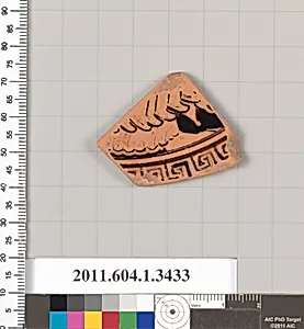 Terracotta fragment of a kylix (drinking cup)