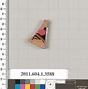 Terracotta fragment of a kylix (drinking cup)