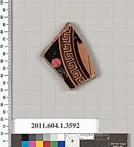 Terracotta fragment of a kylix (drinking cup)
