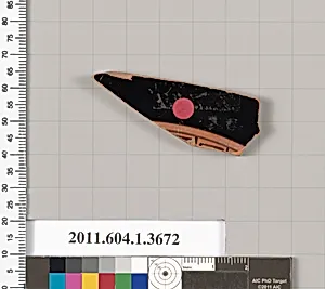 Terracotta fragment of a kylix (drinking cup)