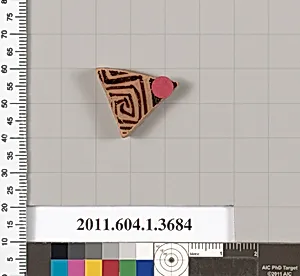 Terracotta fragment of a kylix (drinking cup)