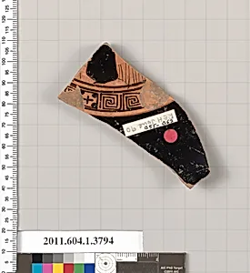 Terracotta fragment of a kylix (drinking cup)