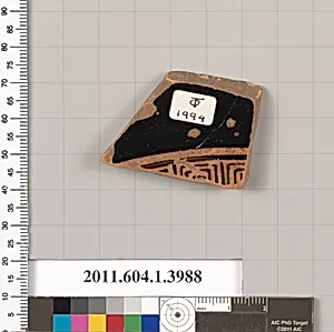 Terracotta fragment of a kylix (drinking cup)