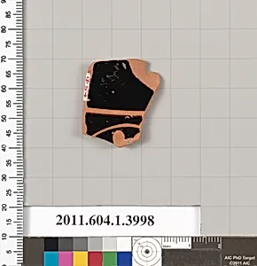 Terracotta fragment of a kylix (drinking cup)