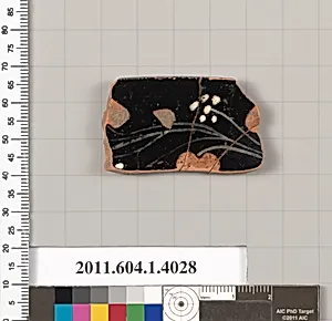 Terracotta fragment of a kylix (drinking cup)