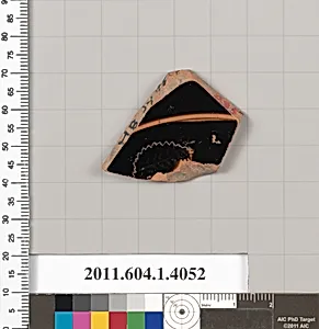 Terracotta fragment of a kylix (drinking cup)