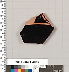Terracotta fragment of a kylix (drinking cup)