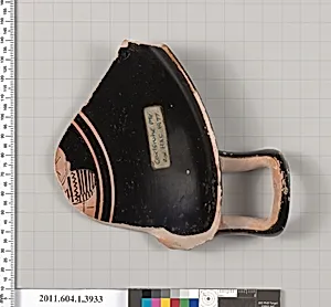 Terracotta fragment of a kylix (drinking cup)