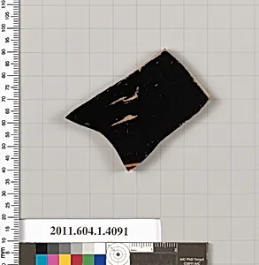 Terracotta fragment of a kylix (drinking cup)