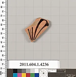Terracotta fragment of a kylix (drinking cup)