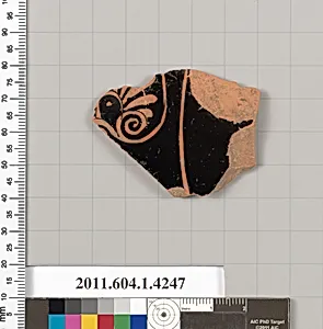 Terracotta fragment of a kylix (drinking cup)