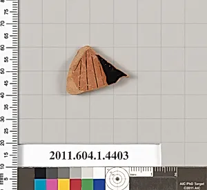 Terracotta fragment of a kylix (drinking cup)