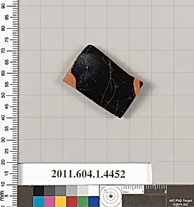 Terracotta fragment of a kylix (drinking cup)