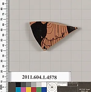 Terracotta fragment of a kylix (drinking cup)