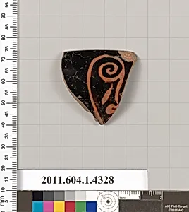 Terracotta fragment of a kylix (drinking cup)