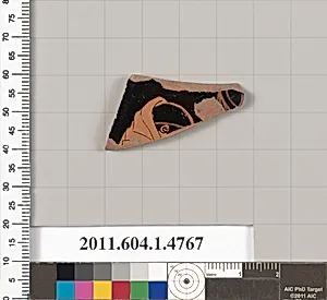 Terracotta fragment of a kylix (drinking cup)
