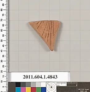 Terracotta fragment of a kylix (drinking cup)