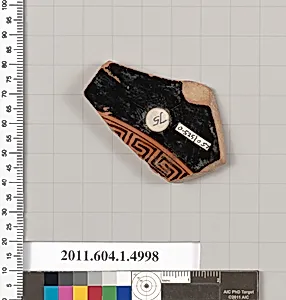 Terracotta fragment of a kylix (drinking cup)