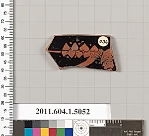 Terracotta fragment of a kylix (drinking cup)