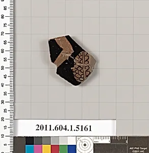 Terracotta fragment of a kylix (drinking cup)