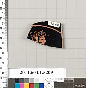 Terracotta fragment of a kylix (drinking cup)