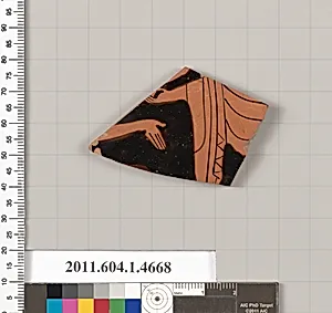 Terracotta fragment of a kylix (drinking cup)