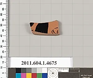 Terracotta fragment of a kylix (drinking cup)