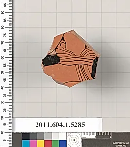 Terracotta fragment of a kylix (drinking cup)