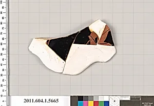 Terracotta fragment of a kylix (drinking cup)