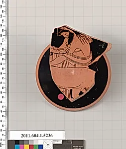 Terracotta fragment of a kylix (drinking cup)