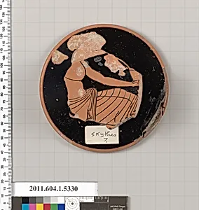 Terracotta fragment of a kylix (drinking cup)