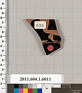 Terracotta fragment of a kylix (drinking cup)
