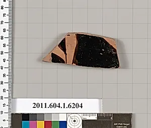 Terracotta fragment of a kylix (drinking cup)
