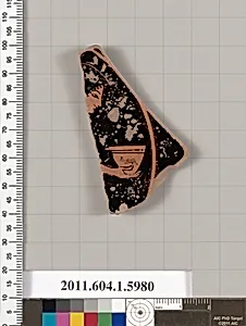 Terracotta fragment of a kylix (drinking cup)
