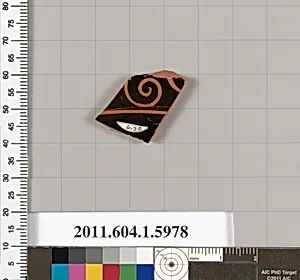 Terracotta fragment of a kylix (drinking cup)