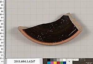 Terracotta fragment of a kylix (drinking cup)