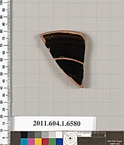 Terracotta fragment of a kylix (drinking cup)