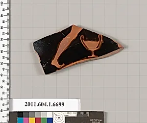Terracotta fragment of a kylix (drinking cup)