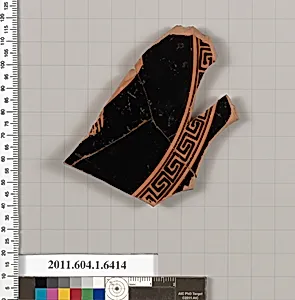 Terracotta fragment of a kylix (drinking cup)