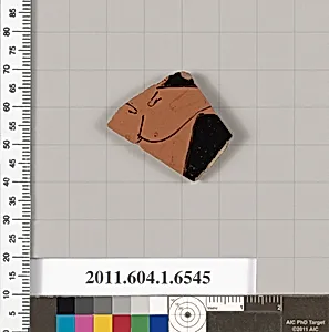 Terracotta fragment of a kylix (drinking cup)