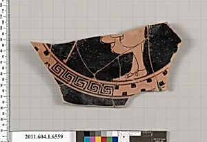 Terracotta fragment of a kylix (drinking cup)