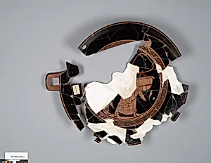 Terracotta fragment of a kylix (drinking cup)