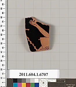 Terracotta fragment of a kylix (drinking cup)