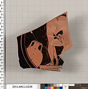 Terracotta fragment of a kylix (drinking cup)