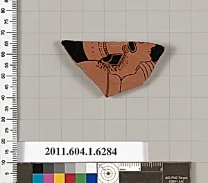 Terracotta fragment of a kylix (drinking cup)